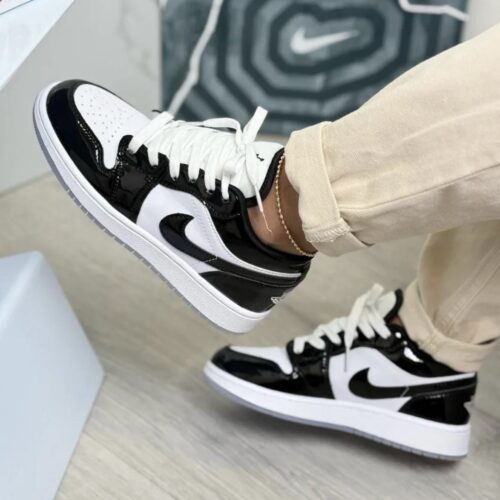 JORDAN RETRO 1 CHAROL NEGRA BLANCA